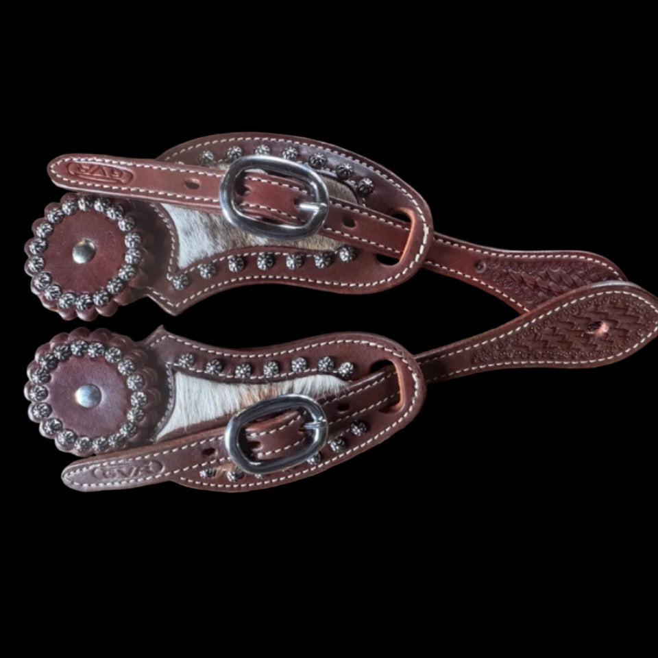 cowhide spurs traps