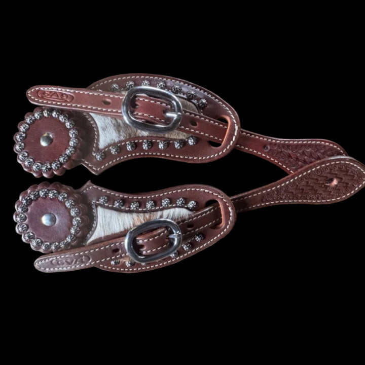 cowhide spurs traps